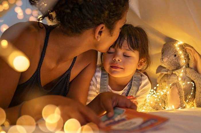 Mother and child enjoying a quiet moment together — the kind of memory life insurance helps protect